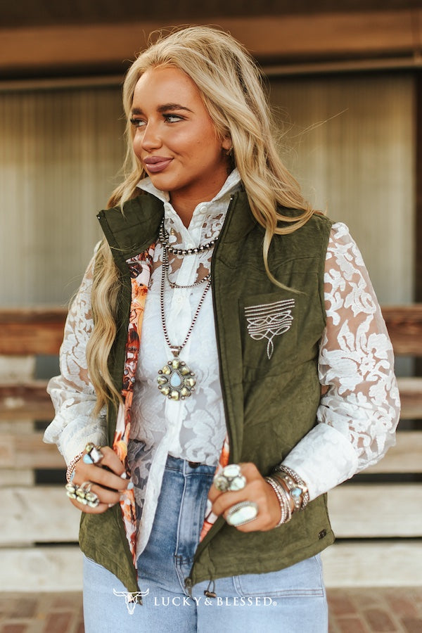 Lucky & Blessed olive quilted vest - front view with embroidery detail